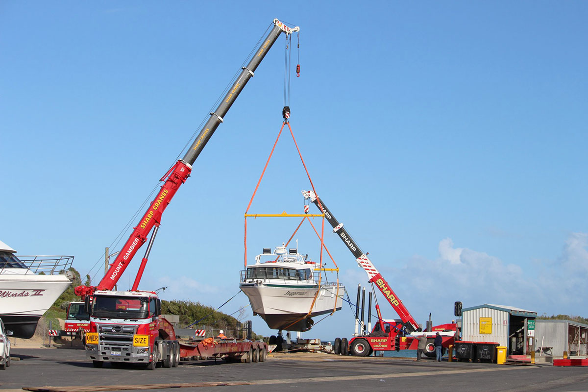 Boats craned to water